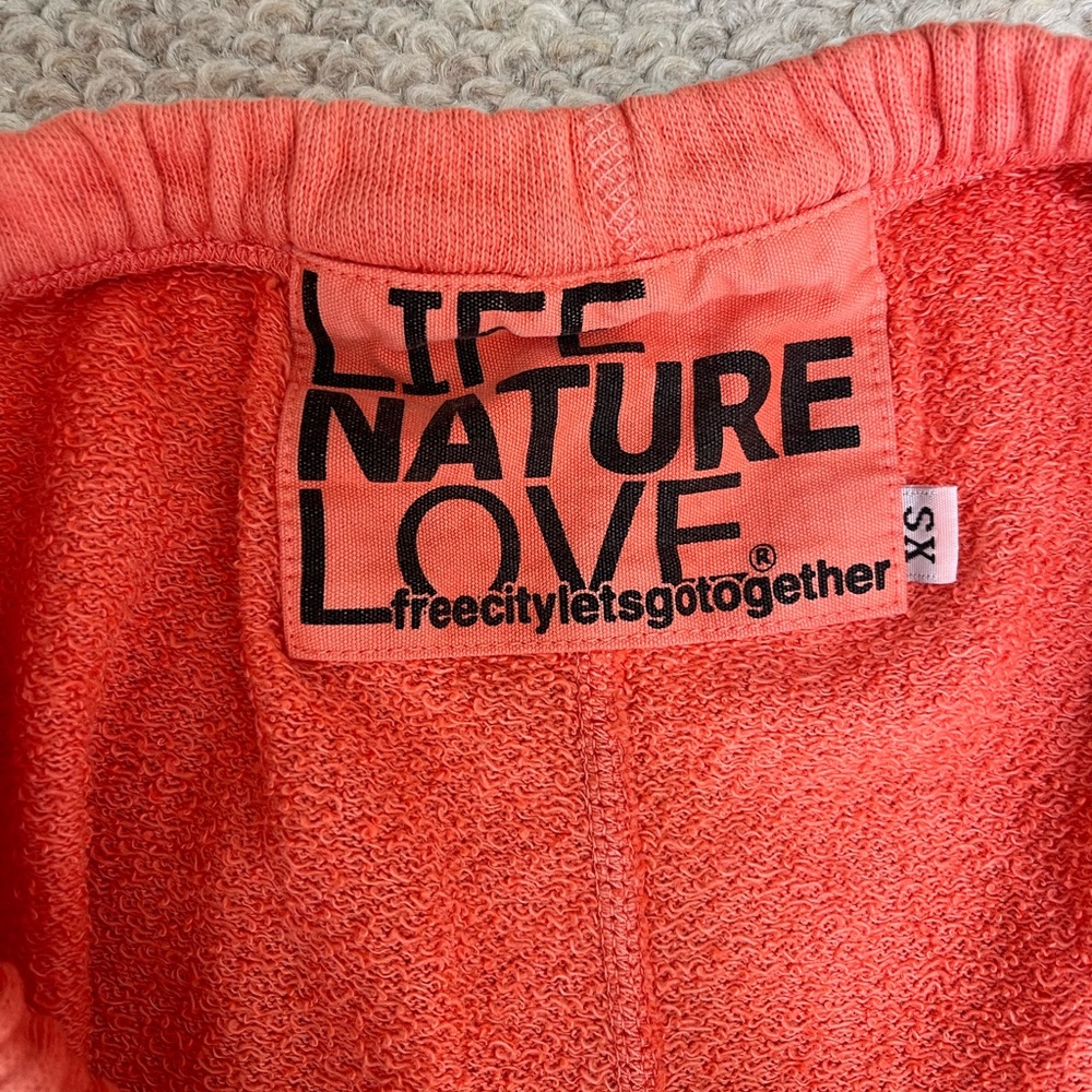 Free city sweatpants XS. Orange/faded orange. Good preowned condition.
